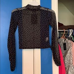 Black and white dotted crop top.